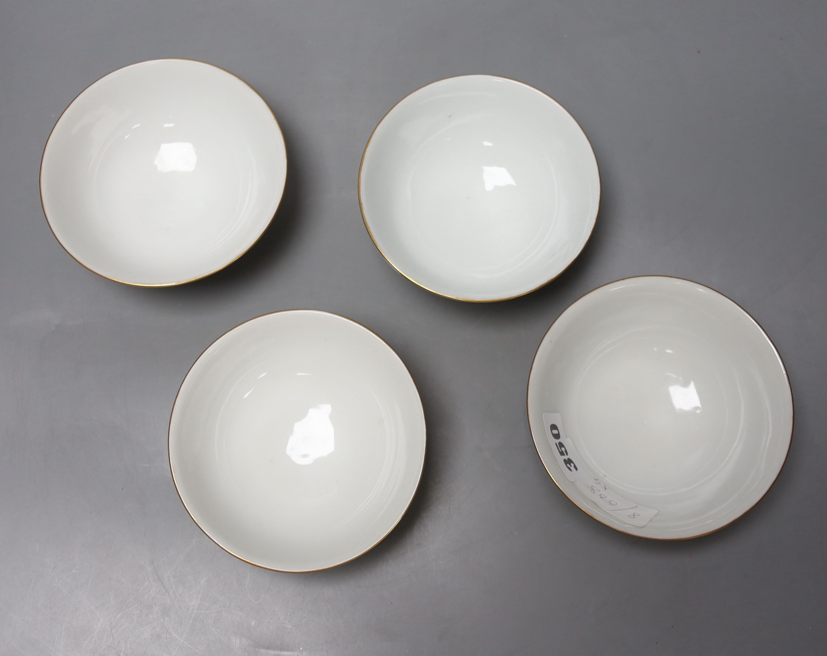 A set of four Chinese yellow ground rice bowls, diameter 11cm